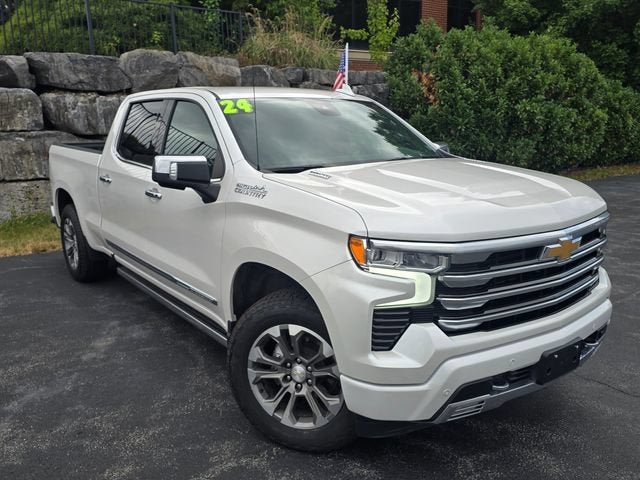 2024 Chevrolet Silverado 1500 High Country in Iridescent Pearl Tricoat — front three-quarter view