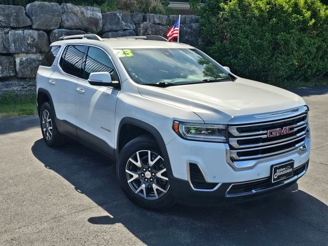 2023 GMC Acadia SLE in Summit White — front three-quarter view