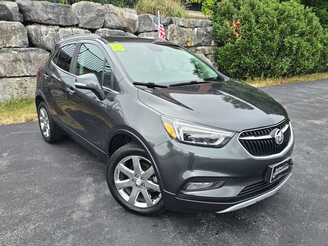 2018 Buick Encore Essence in Includes (Cm5) Black Carbon Metallic Lower Exterior Accent Color, Paint Code W700s. — front three-quarter view