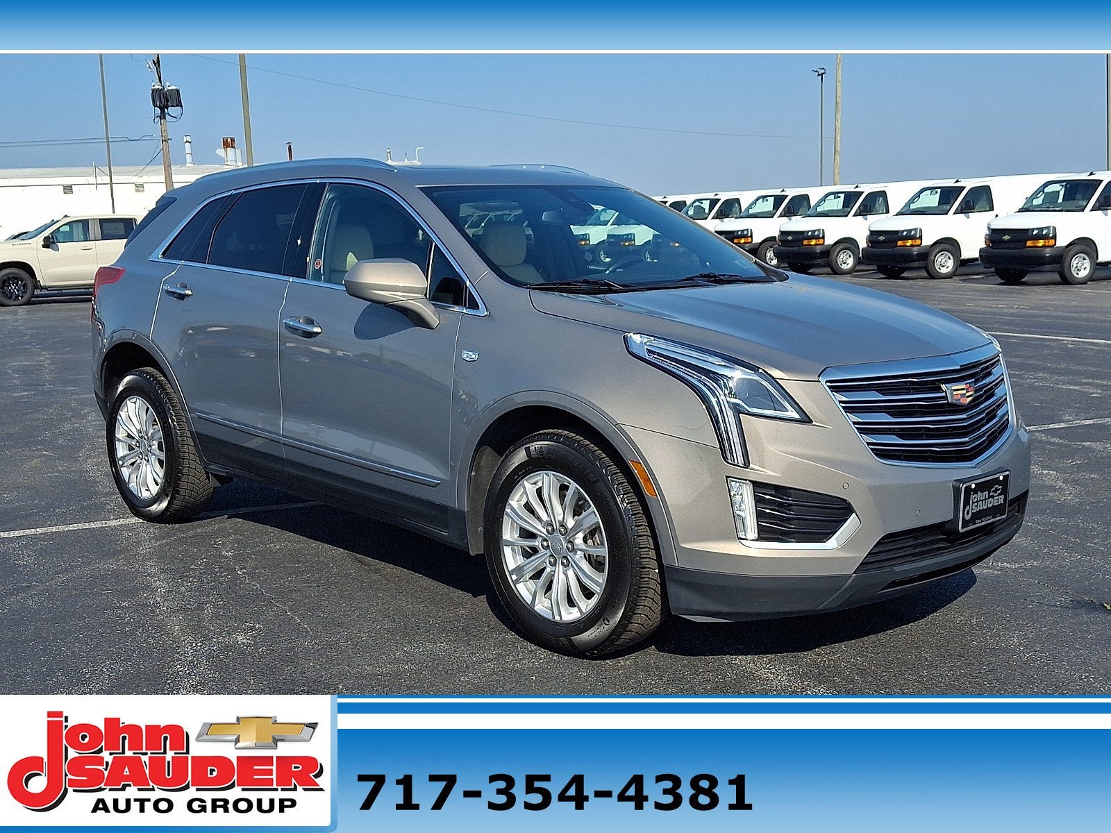 2018 Cadillac XT5 Luxury AWD in Bronze Dune Metallic — front three-quarter view