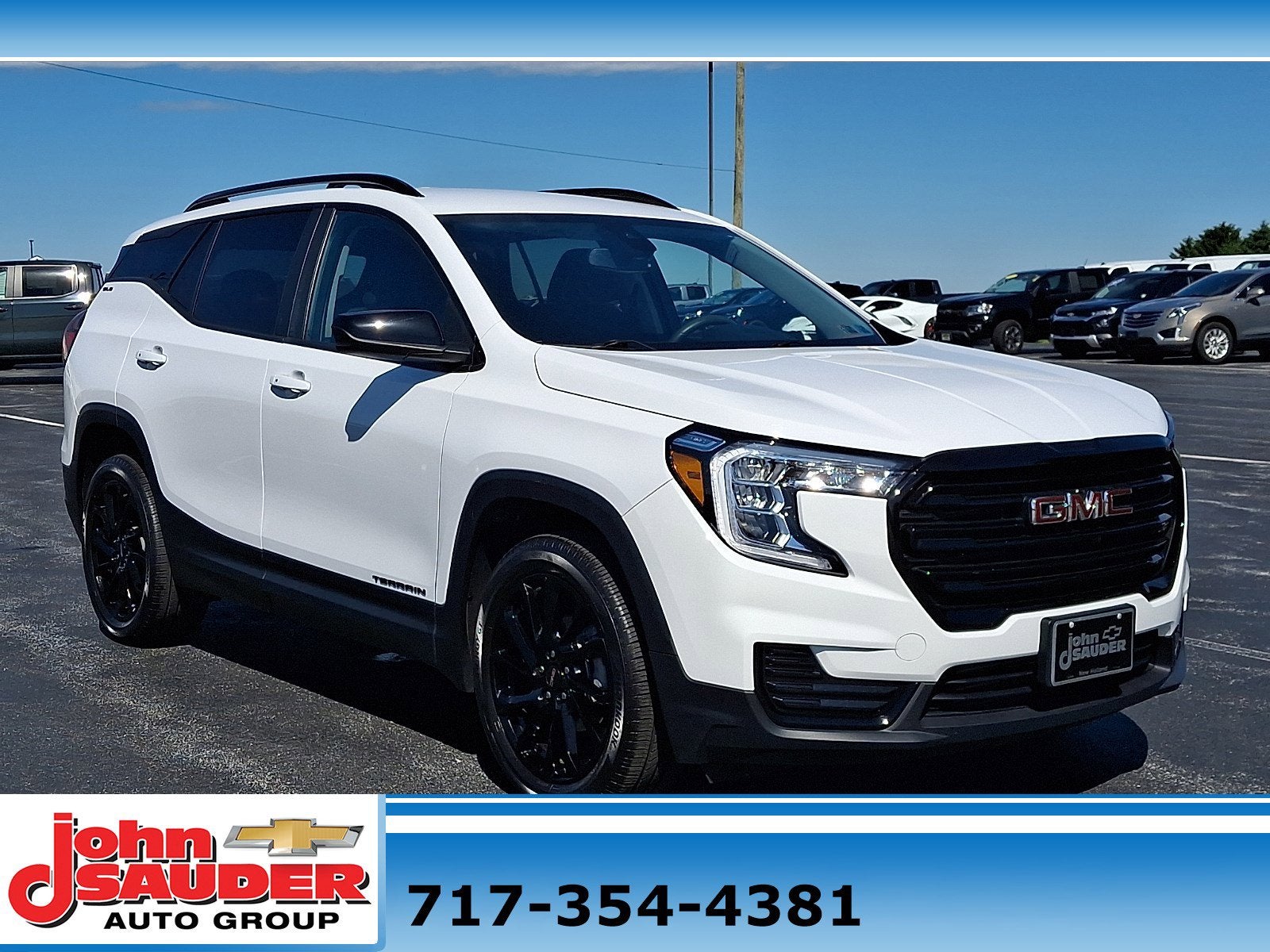 2023 GMC Terrain SLE in Summit White — front three-quarter view